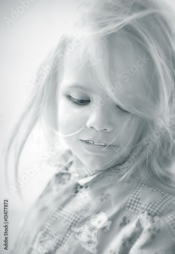 Fototapeta Naklejka Na Ścianę i Meble -  Portrait of the small beautiful girl