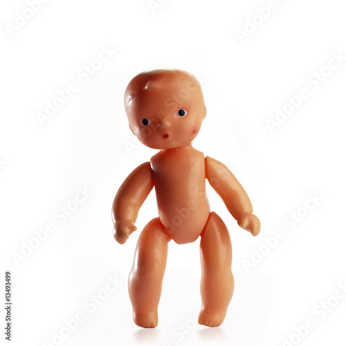 standing plastic baby isolated on white