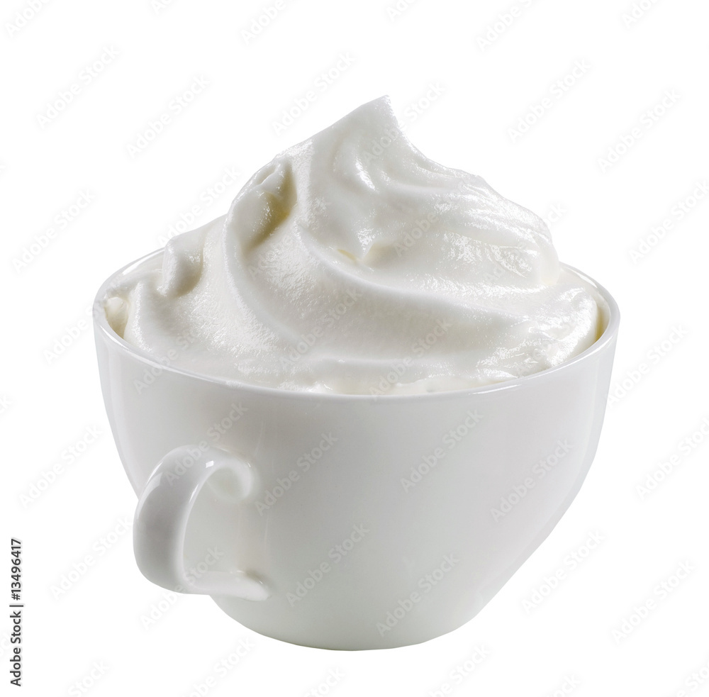 Swirl of whipped cream in a cup Swirl of whipped cream in a cup