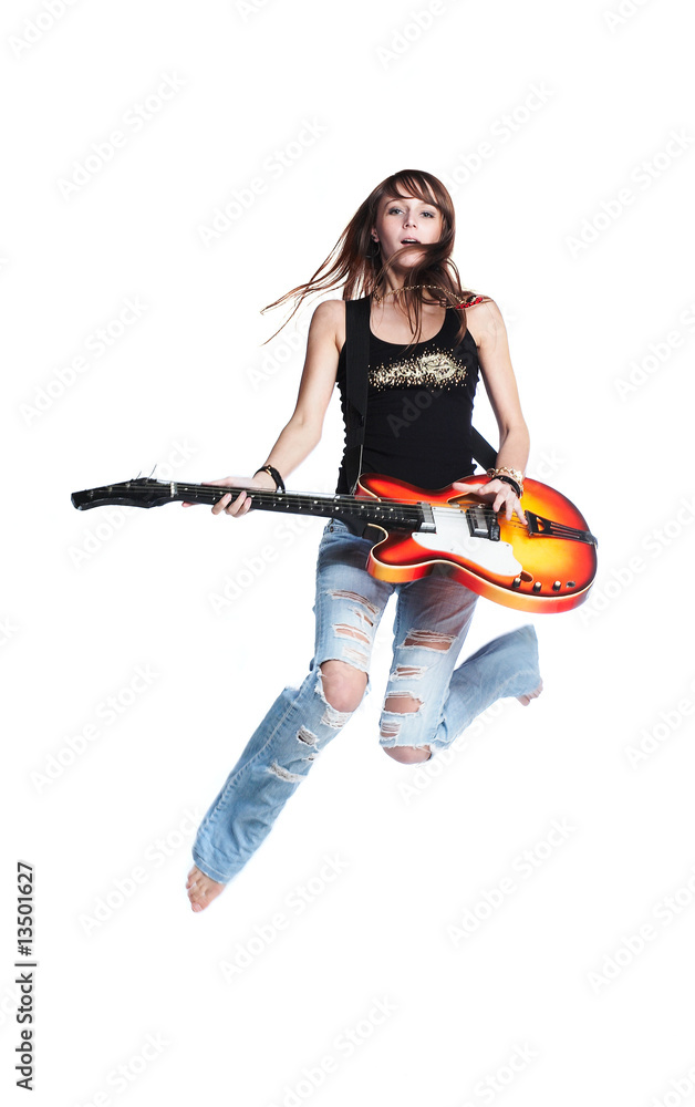 Beautiful rock-n-roll girl jump with guitar Stock Photo | Adobe Stock