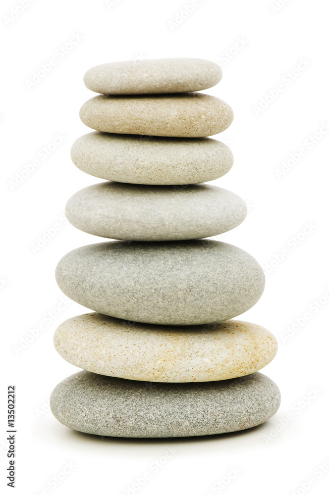 Stack of spa pebbles against blurred background Stack of spa pebbles against blurred background