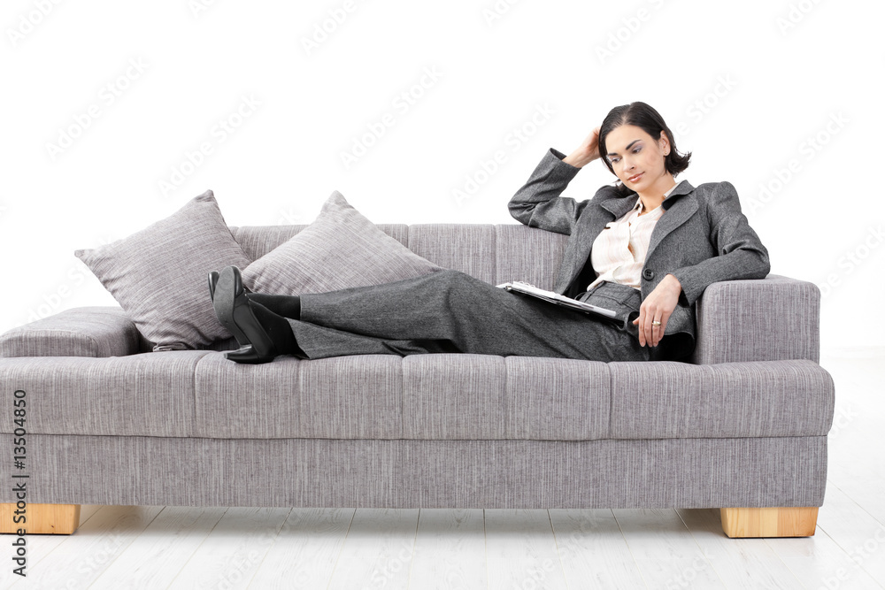 Businesswoman sitting in sofa Businesswoman sitting in sofa