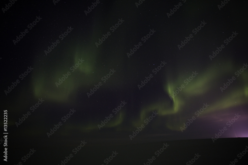 Aurora borealis in the night sky Aurora borealis in the night sky