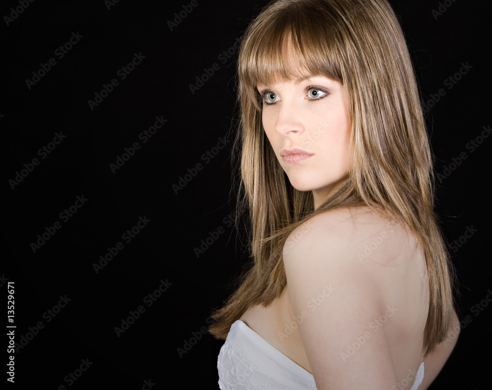 Shot of a Beautiful Brunette Girl against Dark Background Shot of a Beautiful Brunette Girl against Dark Background