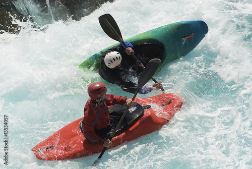 kayak on the wawes of the sea photo