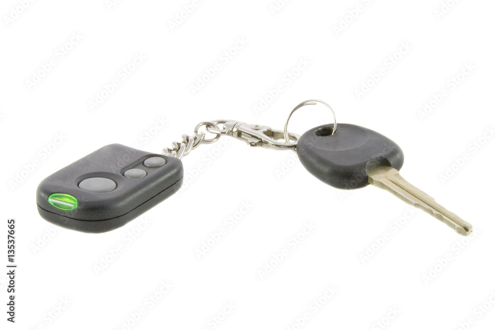 Car keys and remote control of car alarm system isolated over wh Car keys and remote control of car alarm system isolated over wh