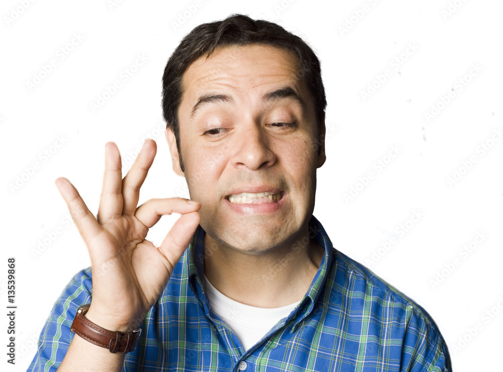 Portrait of an Latino man with puzzled expression Portrait of an Latino man with puzzled expression