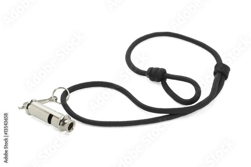 Metal whistle attached to black cord
