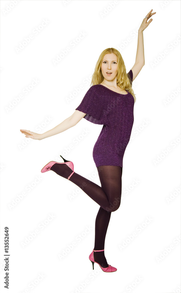 Beautiful girl jumps isolated on a white background Beautiful girl jumps isolated on a white background