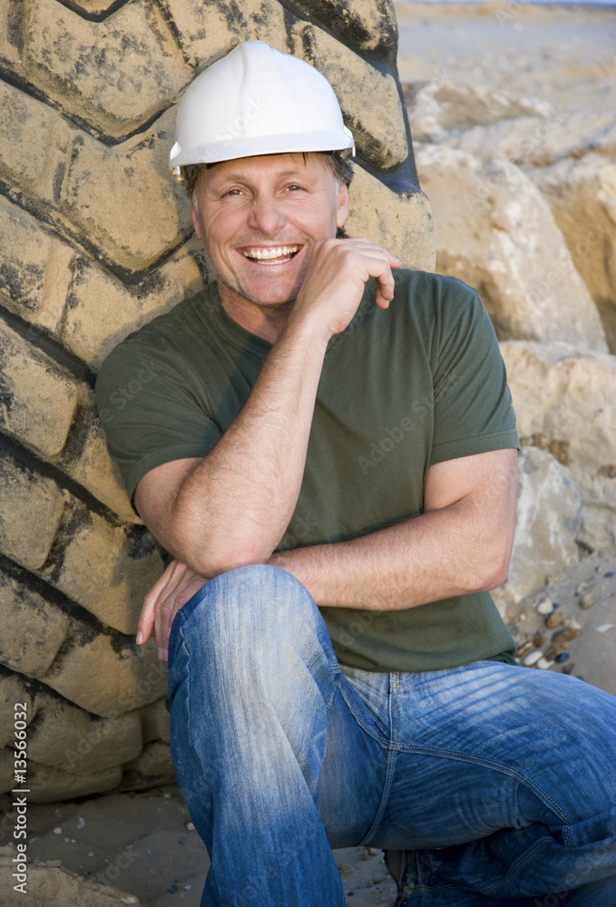 A happy smiling construction worker. A happy smiling construction worker.