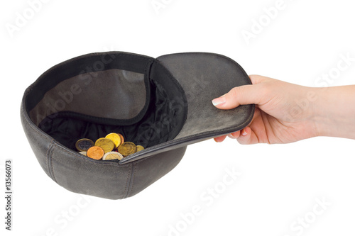 Hand and cap with money