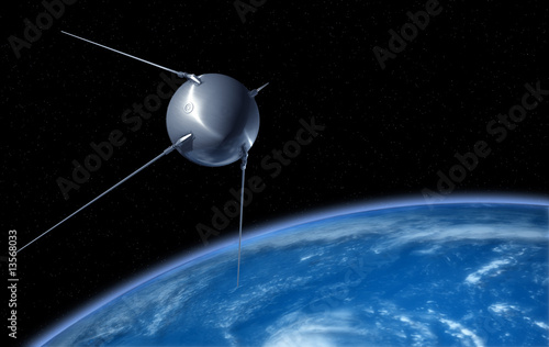 Sputnik satellite on earth orbit photo