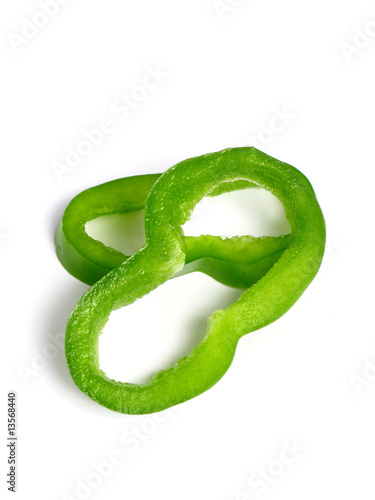 Sliced green pepper on white background