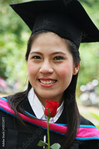 Beautiful Asian university graduate. photo