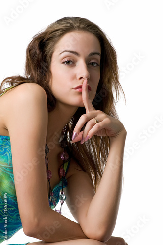 Portrait of beautiful girl showing quietly