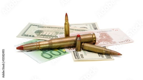 Money and cartridges on whi...