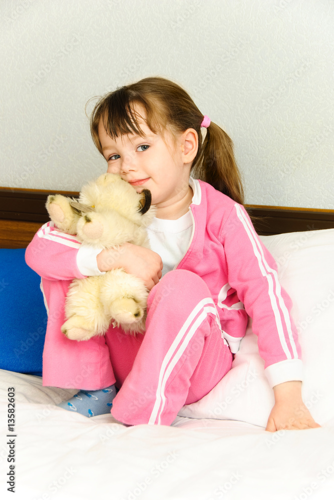 littl girl with a toy littl girl with a toy
