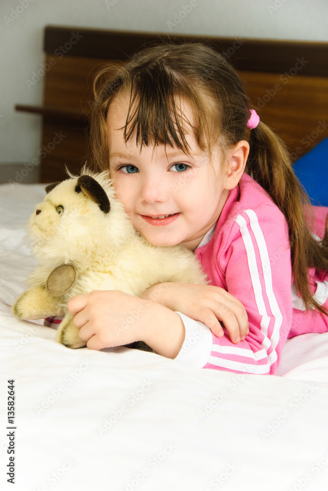 little girl with a toy little girl with a toy