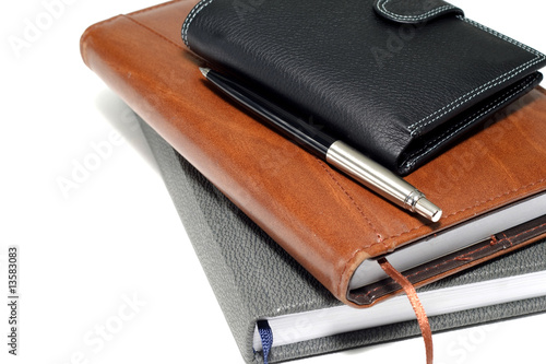 Wallpaper Mural few notebooks and pen isolated on a white background Torontodigital.ca