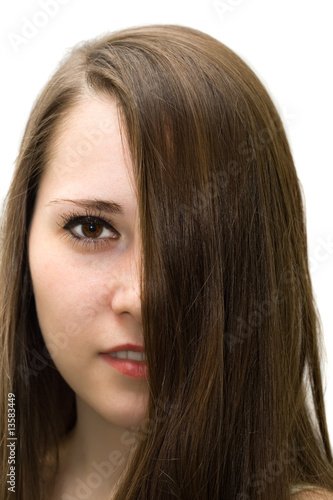 portrait of beautiful girl with long hair on face