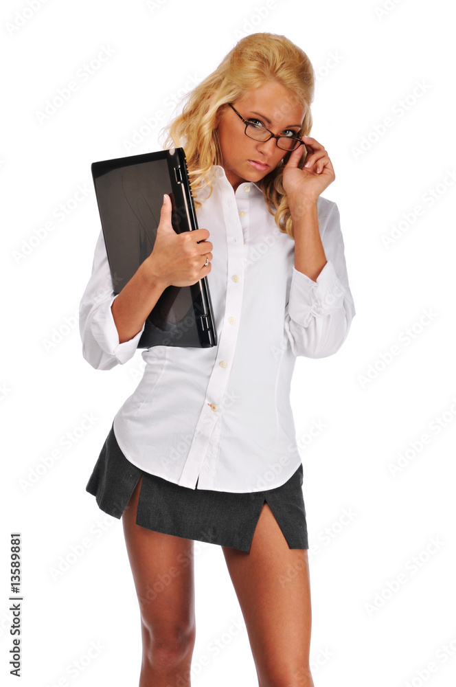 Businesswoman holding her laptop Businesswoman holding her laptop