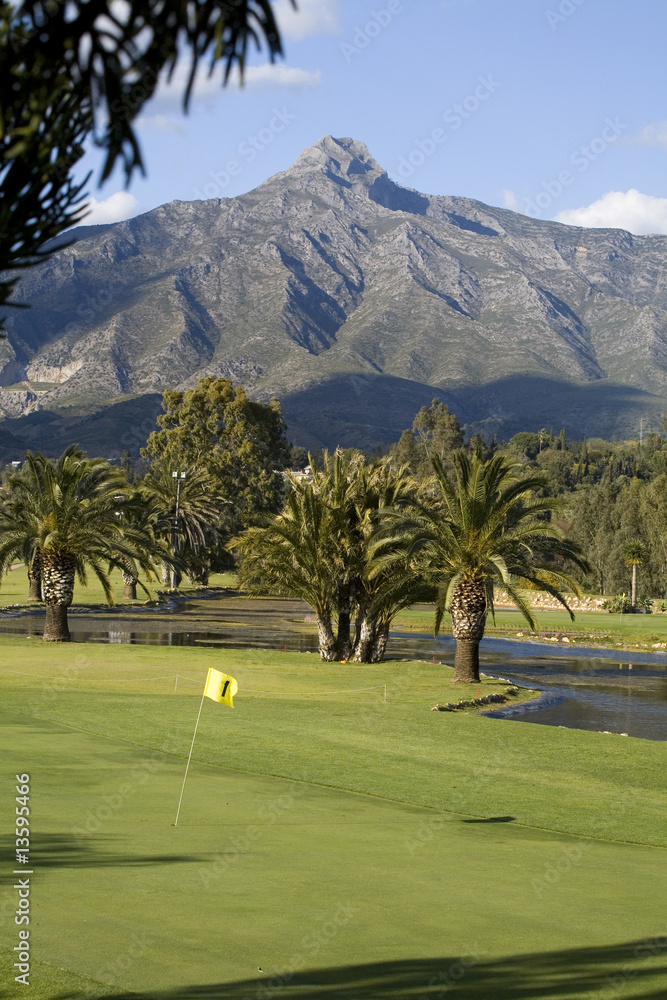 Fototapeta premium Golfing holiday by the mountains