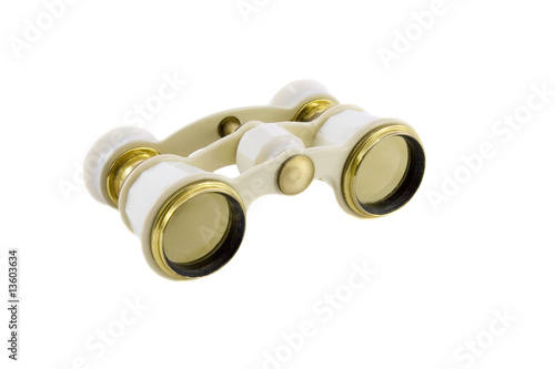 Old opera glasses isolated over white background