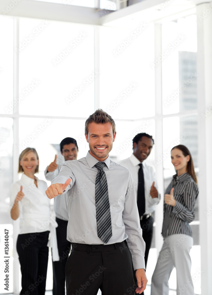 Portrait of a happy young businessman with thumbs-up Portrait of a happy young businessman with thumbs-up