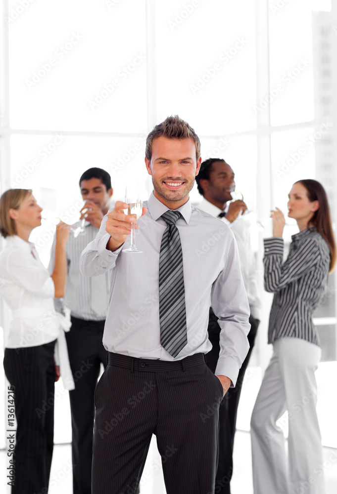 Business Team Celebrating Success with Champagne Business Team Celebrating Success with Champagne