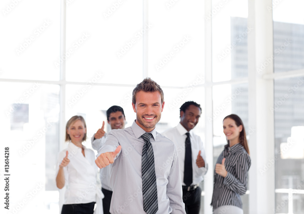 Portrait of a happy young businessman with thumbs-up Portrait of a happy young businessman with thumbs-up