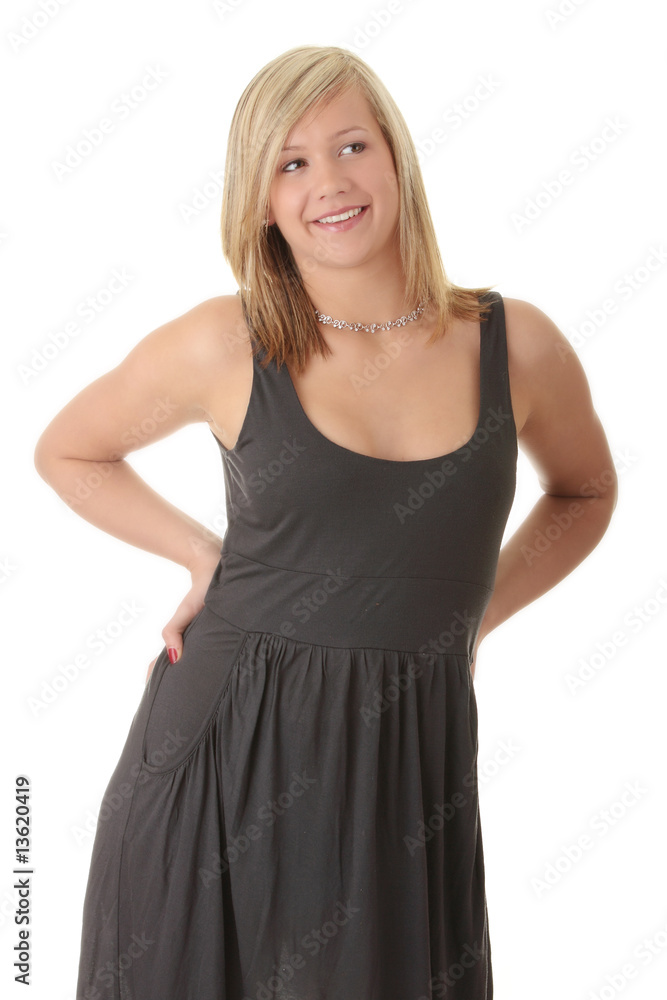 Beautiful teenager young blond girl in grey elegant dress Beautiful teenager young blond girl in grey elegant dress