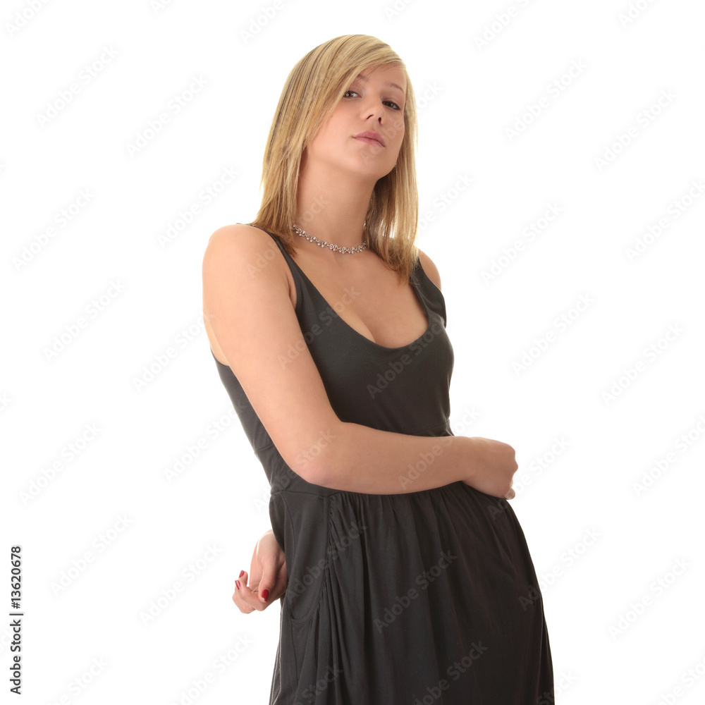 Beautiful teenager young blond girl in grey elegant dress Beautiful teenager young blond girl in grey elegant dress