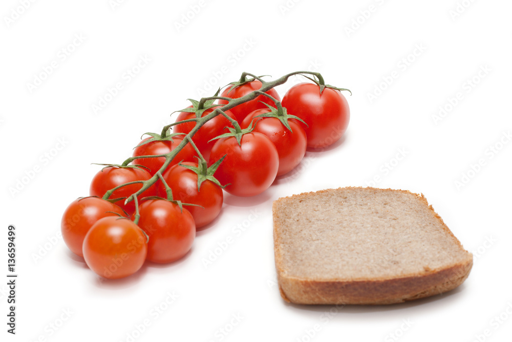 Red tomatoes cherry, pumpernickel two Red tomatoes cherry, pumpernickel two