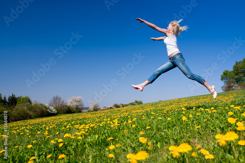 happy young woman on meadow