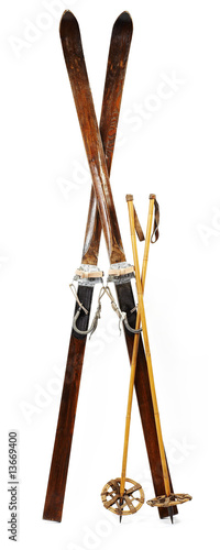 Pair of old wooden alpine skis isolated on white photo