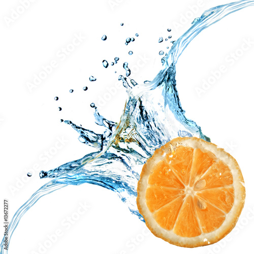 Fresh orange dropped into water with splash isolated on white