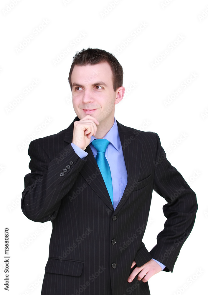 Cheerful young businessman thinking about.. Isolated Cheerful young businessman thinking about.. Isolated