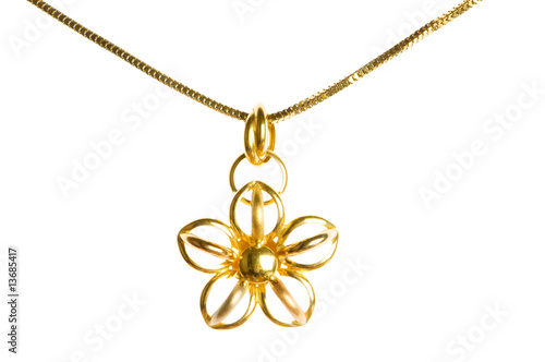 Pendant on golden chain isolated on the white