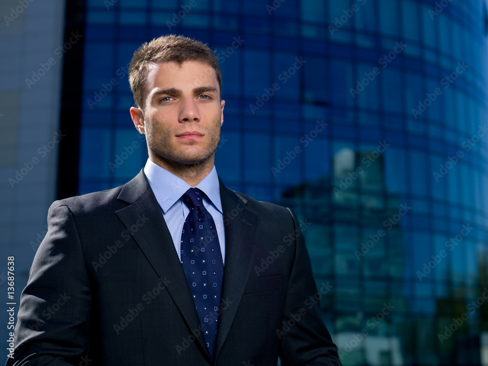Portrait of business man outside the building Portrait of business man outside the building