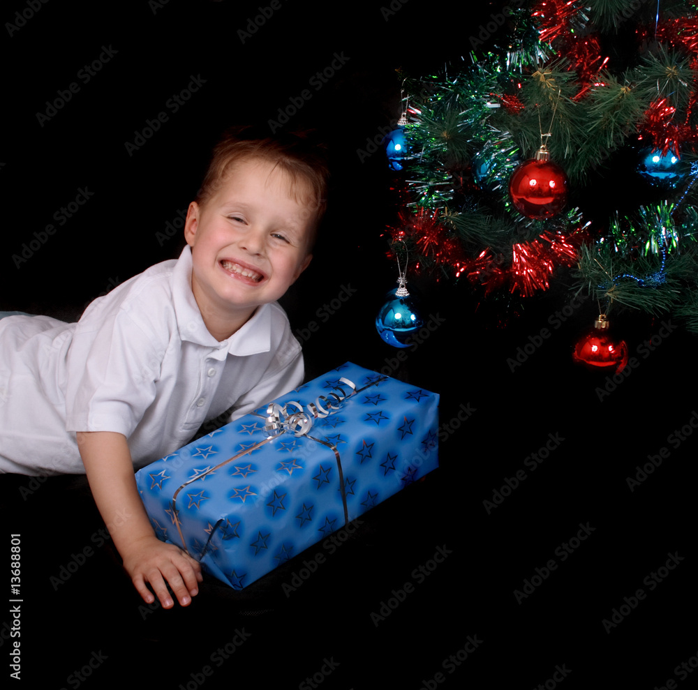 boy and xmas present boy and xmas present