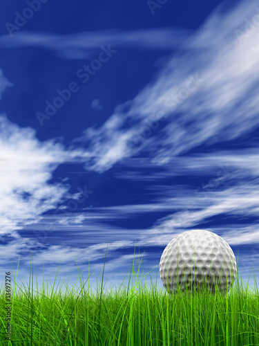 conceptual 3D golf ball on green grass over a blue sky