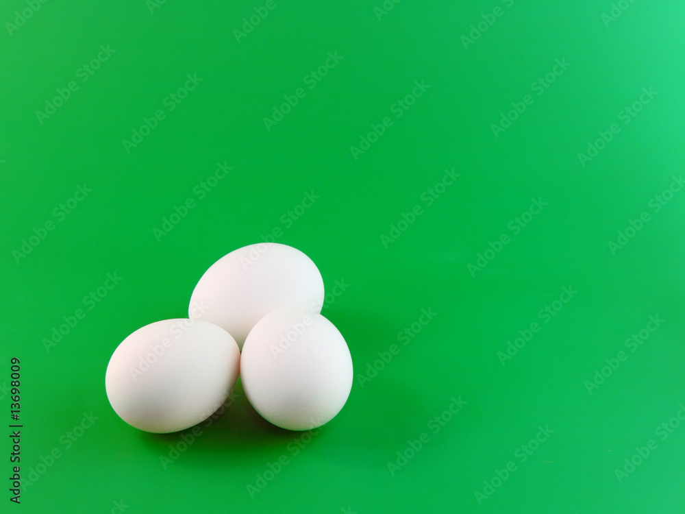 Easter time- Three eggs on green background. Easter time- Three eggs on green background.