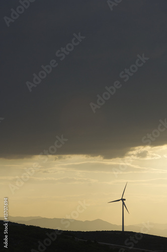 Wind power aerogenerator skyline at dusk