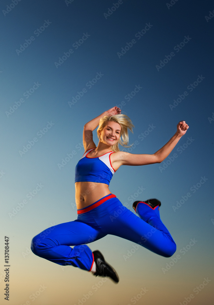 Beutiful woman jumping outdoors Beutiful woman jumping outdoors