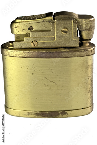 vintage gold gasoline lighter photo