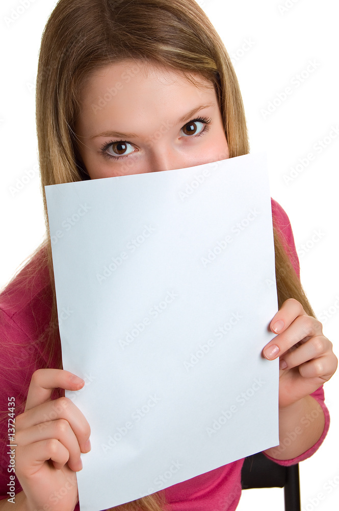 girl shows empty sheet of a white paper girl shows empty sheet of a white paper