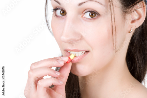 Woman taking pill