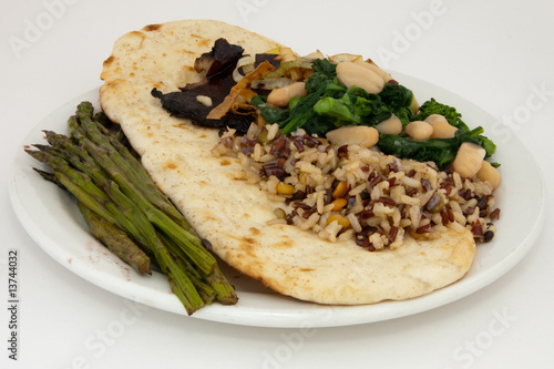 Grilled Portobello mushrooms; Sautéed dandelion greens with cann photo