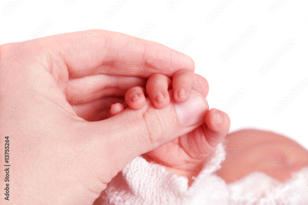Hands of the father and baby. Hands of the father and baby.