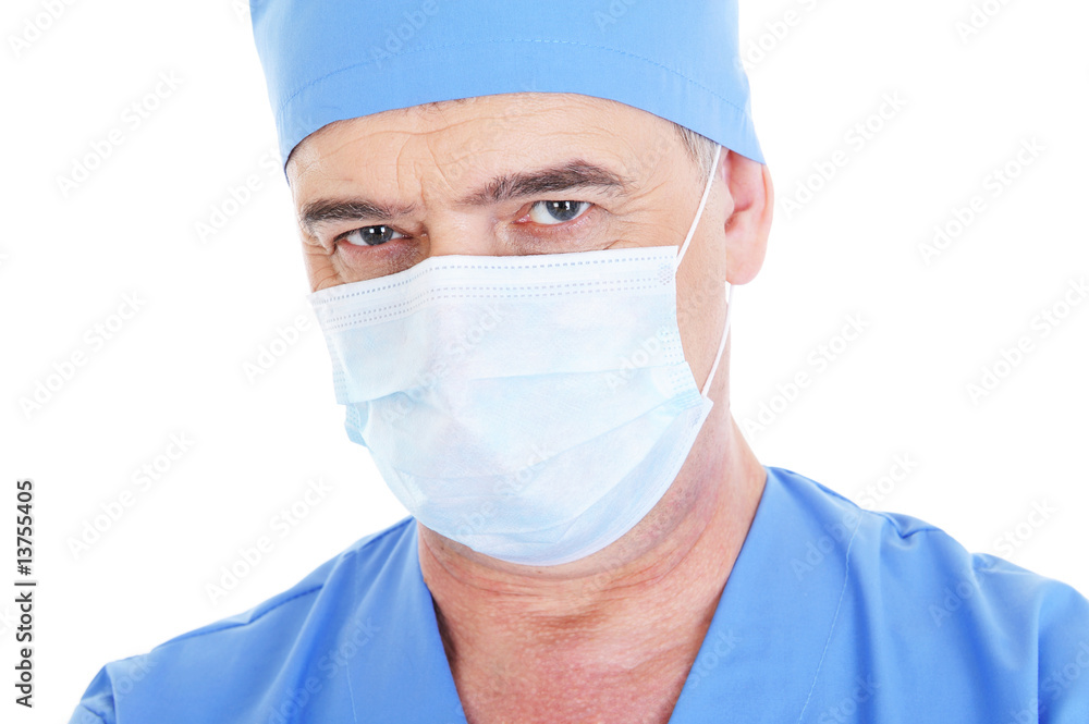 mature male surgeon with medical mask